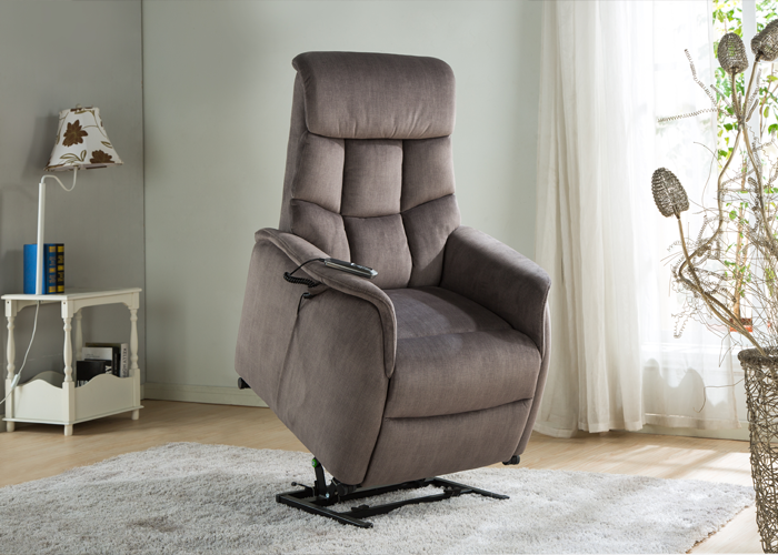 Grauer Sessel in der Funktion Aufstehhilfe